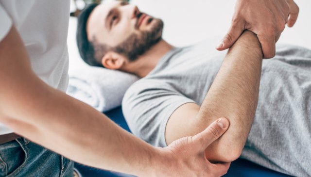 Unlocking Relief From Elbow Pain With Hands-On Therapy and Exercise
